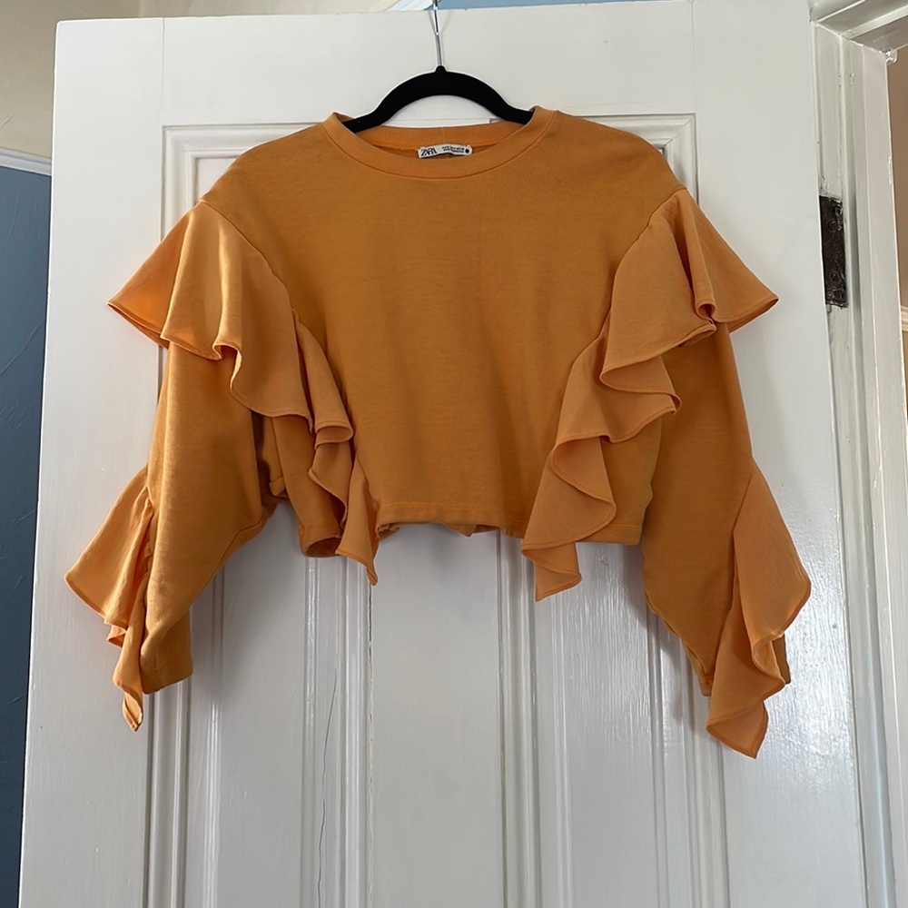 Orange ruffle sweater